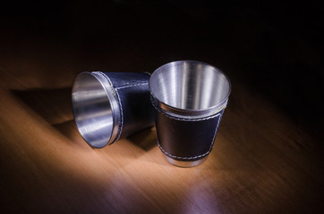 Metal glasses and play with light in different positions.