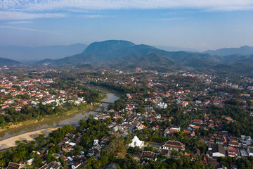 Fototapeta na wymiar (view from above) Stunning aerial view of the beautiful Luang Prabang city with the Nam Khan river flowing through.