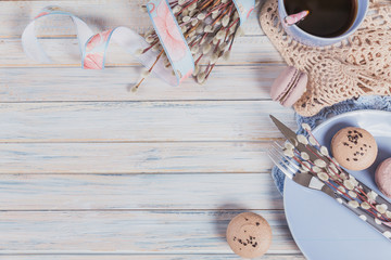 Easter table setting with willow branches and cutlery