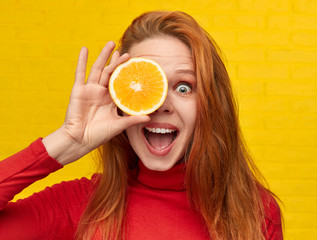 Excited model with orange near eye