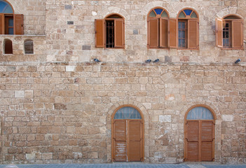 Fototapeta na wymiar stone wall of the ancient Mediterranean city