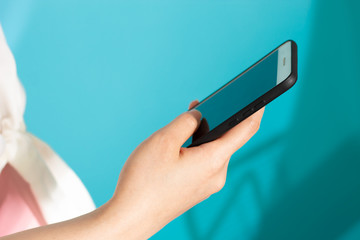 girl and smartphone with blue background for teen business social network