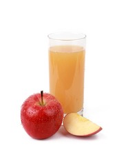  naturally cloudy apple juice - sliced ​red apples with drops of water and a glass of naturally cloudy apple juice in front of white background