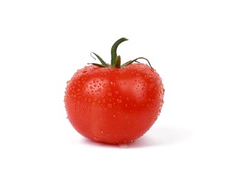 fresh tomato with drops of water isolated on white