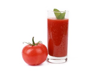 Tasty tomato juice and tomato's - glass with fresh tomato juice and a fresh tomato with drops of water isolated on white