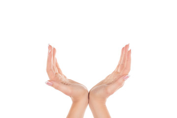 Female hands making gesture, open palms together, isolated on white
