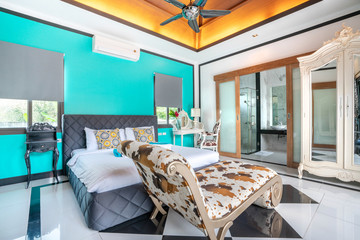 Luxury real Interior design in bedroom of pool villa with cozy king bed. with high raised ceiling  home, house ,building