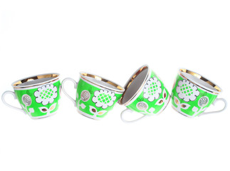 Set of retro ceramic cups with patterns isolated on white background.