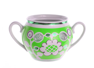 Retro ceramic sugar bowl with patterns isolated on white background.