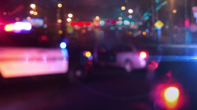 Police Patrol Car at Scene of Emergency (Optical Lens Defocus)