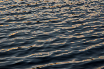 Wavy ripples on lake surface