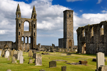 14th Century stone ruins of east tower and south wall of St Andrews Cathedral with 12th Century St Rules Tower St Andrews Fife Scotland UK