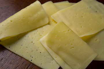 cheese on a wooden board