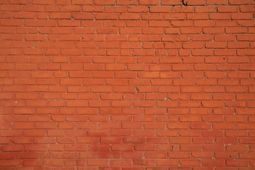Fototapeta na wymiar Rustic red brick wall used for house construction