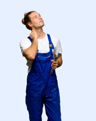 Workman thinking an idea while scratching head on isolated background