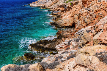 Palm beach (Agia Irini) on Paros island, Greece. Picturesque greek beach with huge palms in Cyclades Islands