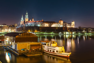 Wawel Castle in Krakow seen from the Vistula boulevards. Krakow is the most famous landmark in Poland