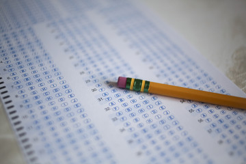 Back to School Concept Standardized Testing Yellow Number 2 Pencil on a Fillable Testing Form