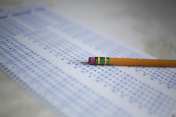 Back to School Concept Standardized Testing Yellow Number 2 Pencil on a Fillable Testing Form