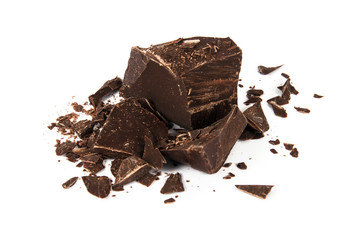 Pieses of crashed black chocolate isolated on white background