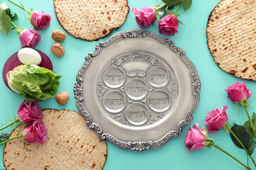 Pesah celebration concept (jewish Passover holiday). Translation for Hebrew Text horseradish,...