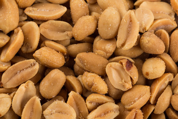 large amount of peeled salted peanuts