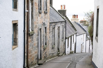 Culross fife Scottish village houses on road steep slope