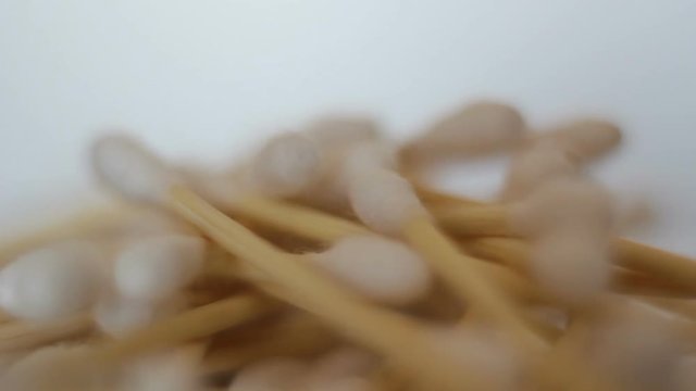 Pile of Bamboo cotton swabs rotating. Zero waste, plastic free lifestyle concept