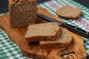 Karelian bread made from whole grain flour located on a wooden board