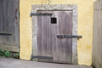 Old oak wooden door rustic ancient house entrance in Culross