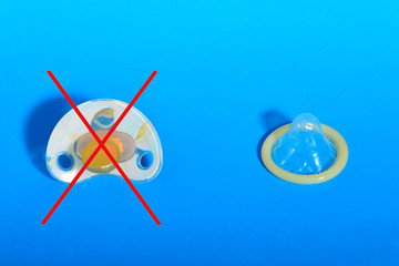 Stripped nipple with a condom, the concept of healthy sex, birth - against, contraception - for.