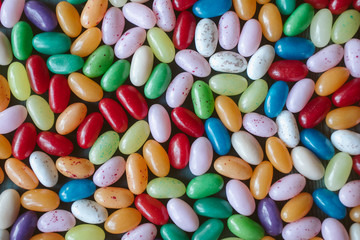 Colorful jelly beans as texture and background. Close up view of jelly candy beans.