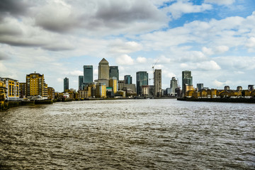 Canary Wharf skyline at dusk - modern business district, hi rise properties, headquarters of major...