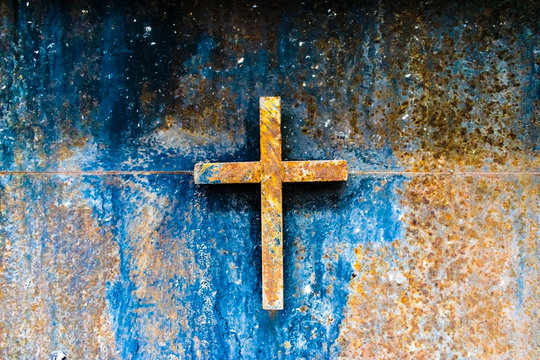Cross relief  rusted iron