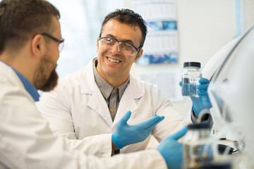 Two mature scientists collaborating for research