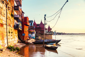 Ganges river aerial view in Varanasi, India. Ghats with boats in the morning