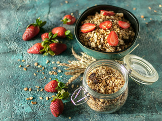 Baked muesli and fresh strawberries. Homemade Granola. Delicious and healthy breakfast. Selective focus