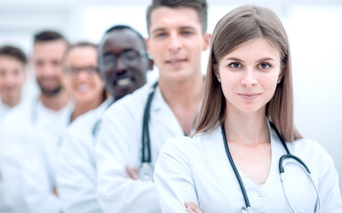 Fototapeta premium doctors team showing finger in camera