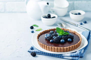 Chocolate tart with blackberries and blueberries