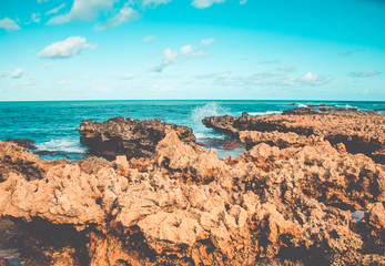 Sea waves hitting rocks on the beach in Coqueirinho,Paraiba, Brazil. Clean Rocks  on Beach 