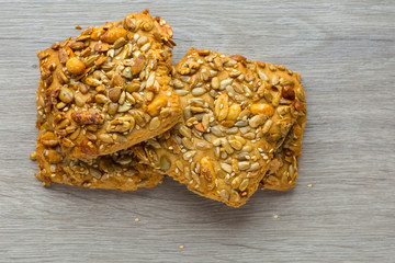 Muffin cookies with nuts and flakes. Close-up. Copy space. Concept: healthy food, healthy breakfast.