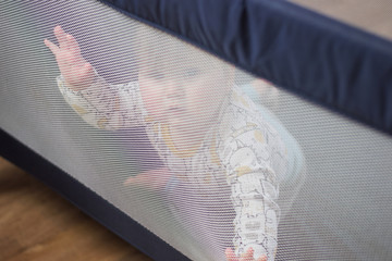 Baby wants out of the playpen
