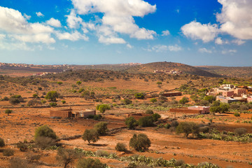 Panoramic Moroccan landscape with hills and cactuses