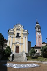 Fototapeta na wymiar Church of martyrs and bell tower of collegiate church in Atona, Italy