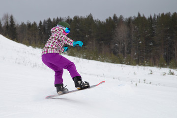 snowboarder jumping in air