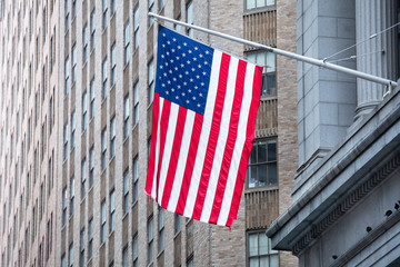 American Flag Hanging Outside Building