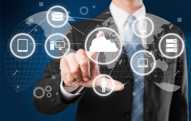 Businessman and internet and virtual reality concept - businessman pressing button on virtual...