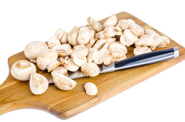 Sliced fresh white champignons for cooking.
