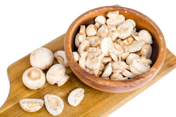 Sliced fresh white champignons for cooking.