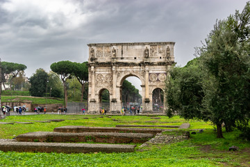 Fototapeta premium The Arch of Constantine, a triumphal arch in Rome situated between the Colosseum and the Palatine Hill erected by the Roman Senate in the year 312
